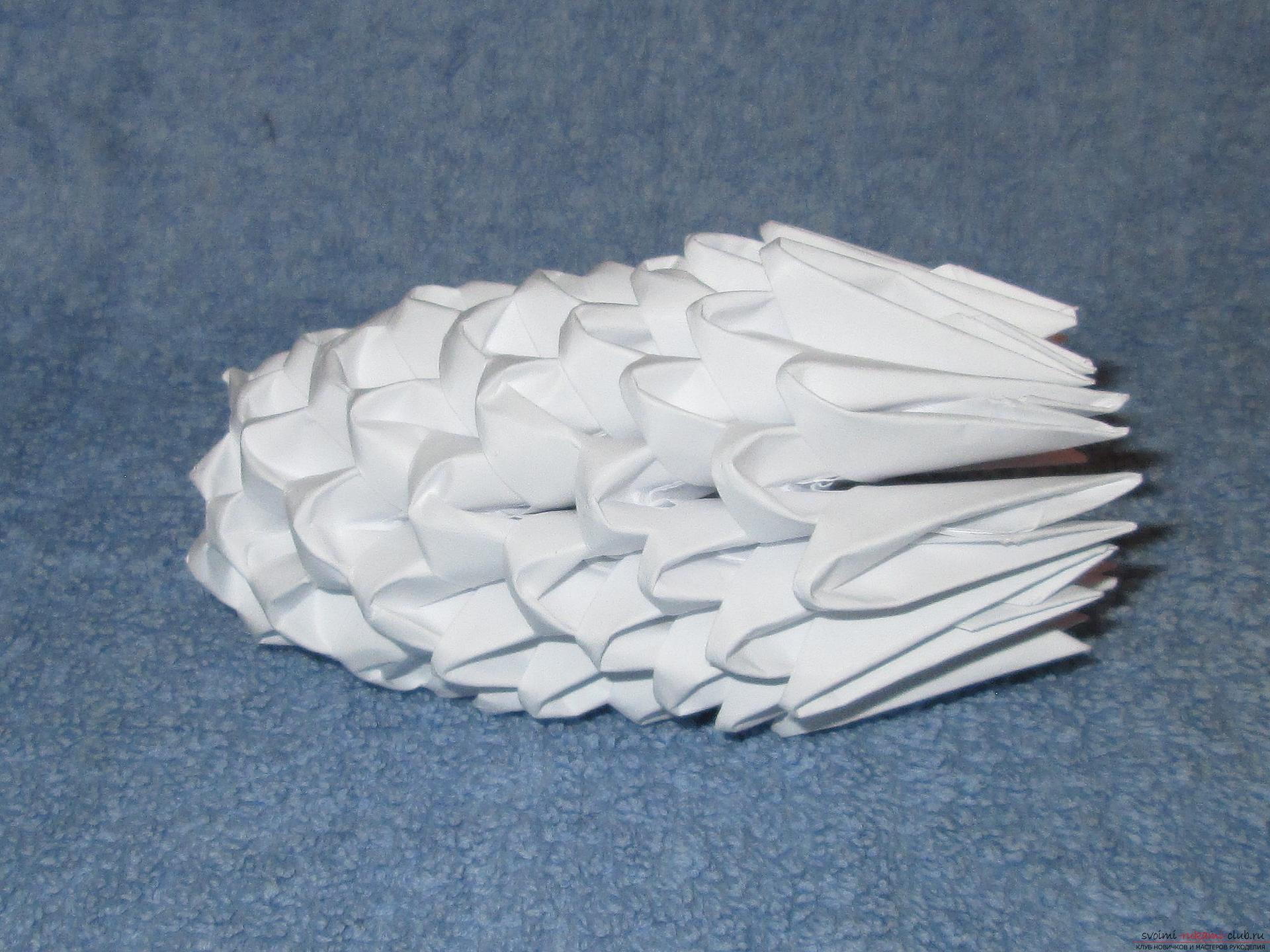 Если вы любите собирать модульное оригами, этот мастер-класс по созданию дельфина из бумаги для вас.. Фото №7